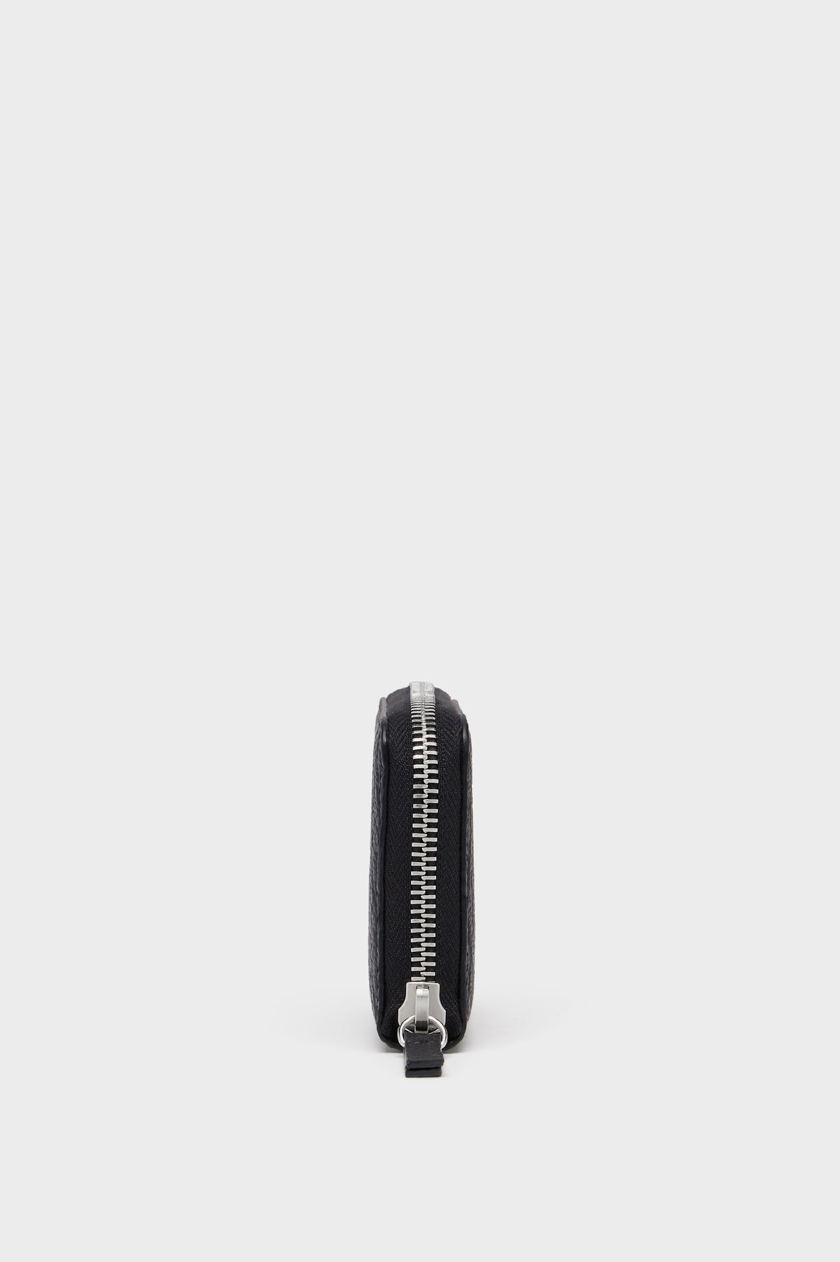 Four Stitches Zip Coin Holder