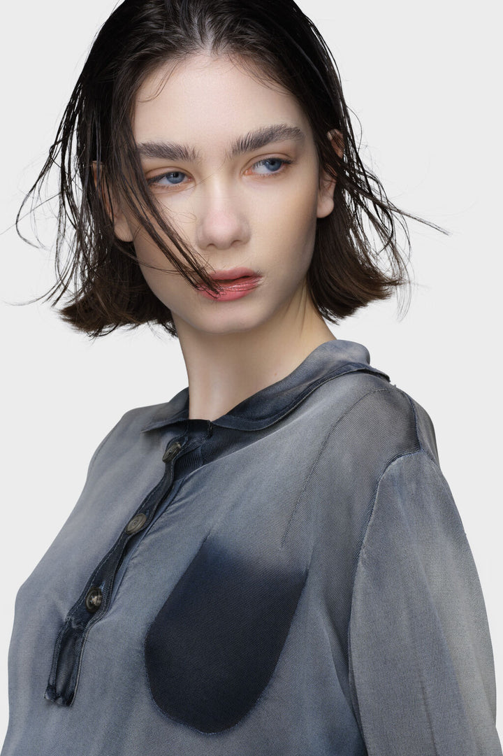 Sun-faded polo top